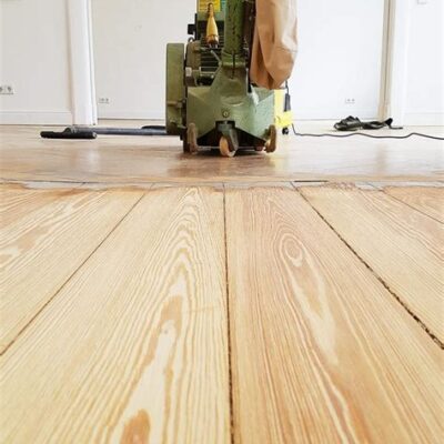Floor Sanding After stripping away the existing finish, the next step involves sanding the floor. Floor sanding entails the removal of the top layer of timber, revealing the underlying healthy wood. This process also addresses any inconsistencies along the edges of the floorboards. In the initial sanding phase, experts also inspect for issues such as cupping, peaking, or crowning in the floorboards. If identified, these problems are either targeted for specific treatment or the affected floorboards are replaced.